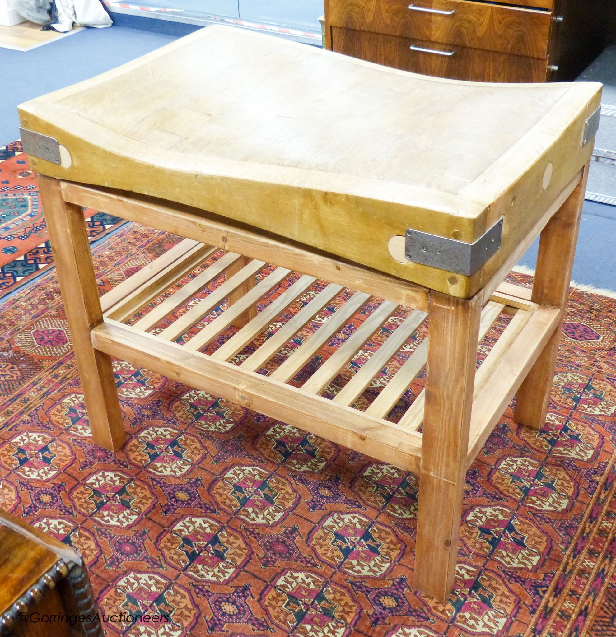 A beech butcher's block on a pine stand, 91.5cm wide